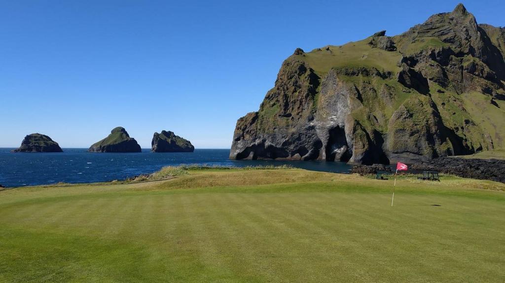 The Westman Island Golf Club is a golf club located on the Westman Islands (Vestmannaeyjar in Icelandic), on the island of Heimaey off the southern coast of Iceland. The club was established in 1938 as a nine-hole course and is the third oldest golf club in Iceland. The course was expanded to 18 holes in the early 1990s by Hannes Thorsteinsson. It is the southernmost golf course in Iceland and is located in between an extinct volcano and the Atlantic Ocean.
